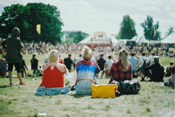 festival goers listening to music